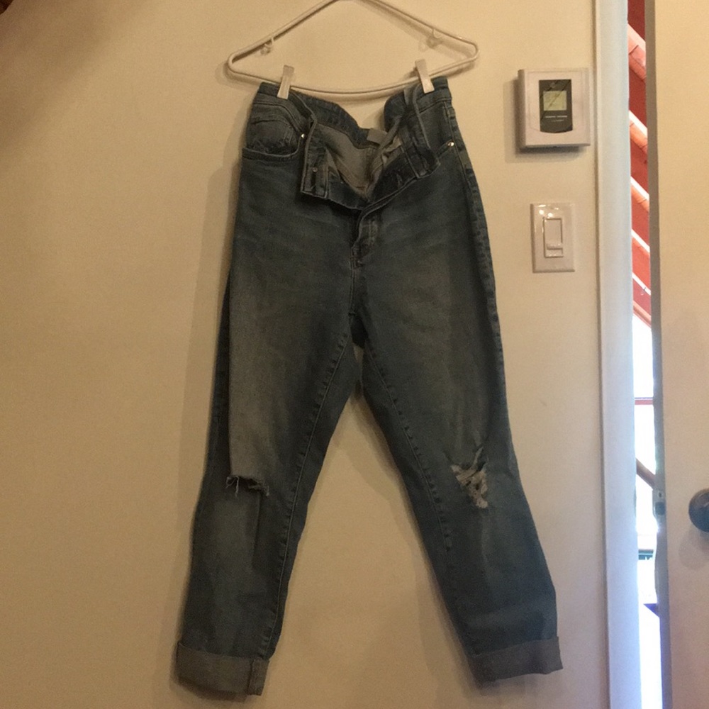 Ripped and rolled pale jeans